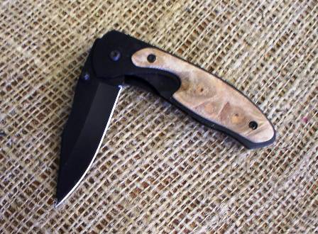 wood/black pocket knife